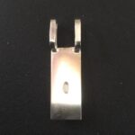 Zilveren hanger met vingerafdruk, met ruimte voor as van de overledene aan de achterkant